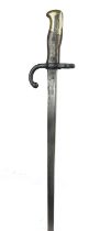 A French model 1874 Gras bayonet, blade marked for St Etienne 1875, steel scabbard.