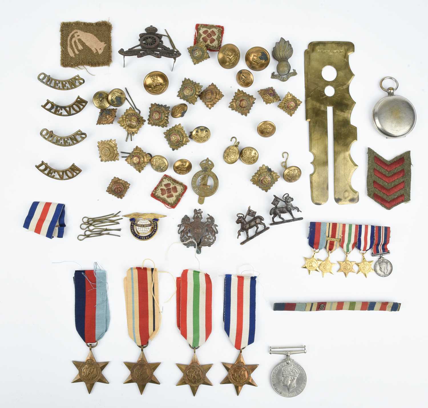 A collection of Second World War medals and insignia, comprising: 1939-45 Star, Africa Star, Italy - Image 2 of 2