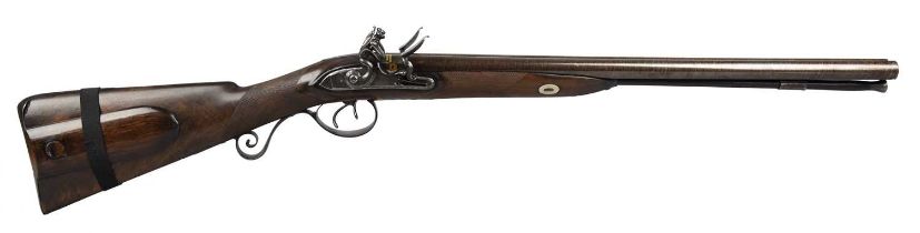 A scarce English flintlock double rifle of approximately .700 calibre by H.W. Mortimer, browned