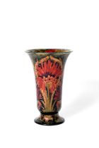 'Brown Chrysanthemum' a Moorcroft Pottery vase designed by William Moorcroft, footed form,