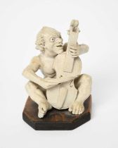 A Martin Brothers stoneware Imp Musician by Robert Wallace Martin, dated 1906, modelled seated