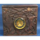 A Victorian clock movement with eight day striking mechanism and visible escapement, set in a carved
