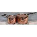 Four Georgian copper graduated saucepans and lids with steel handles