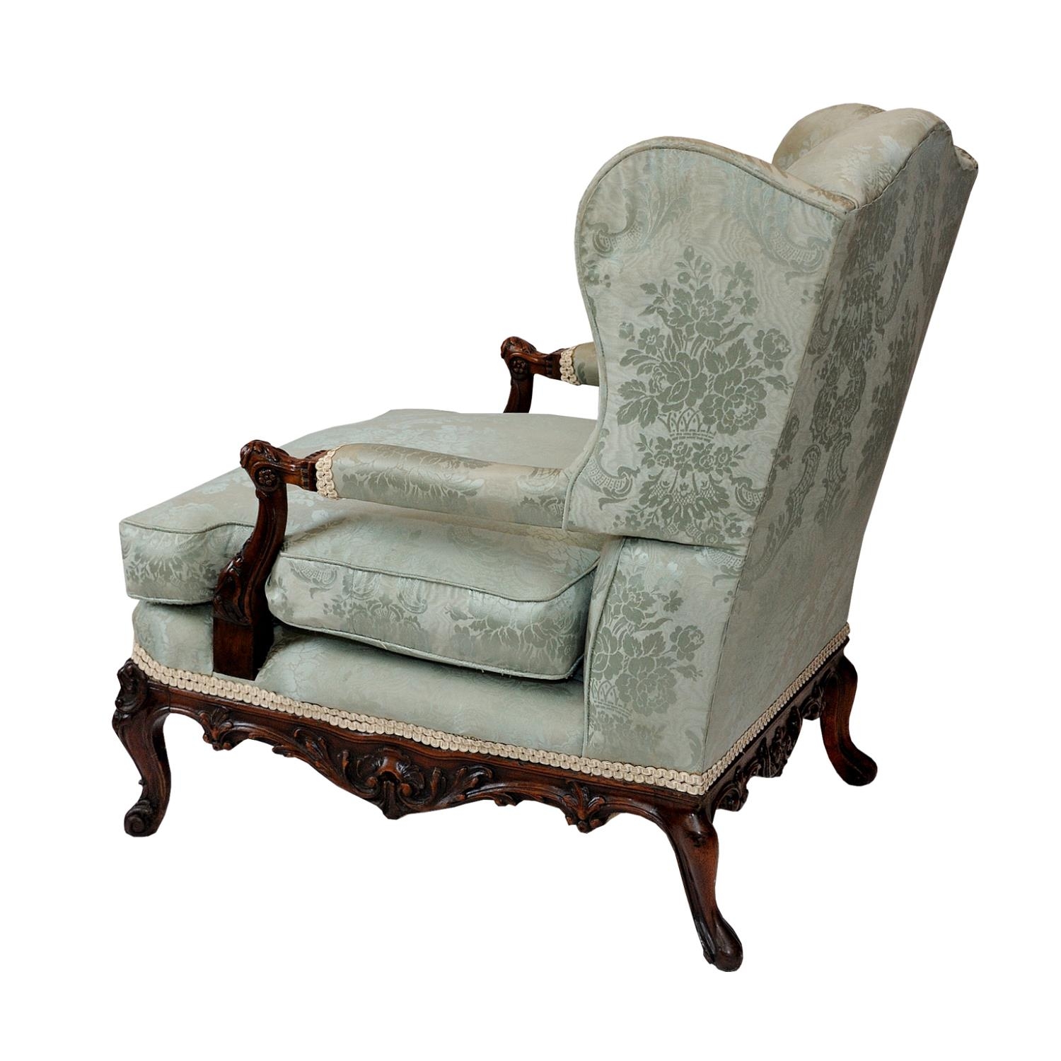 19th century open armchair, the carved show wood frame with shell, scroll and other detail, raised