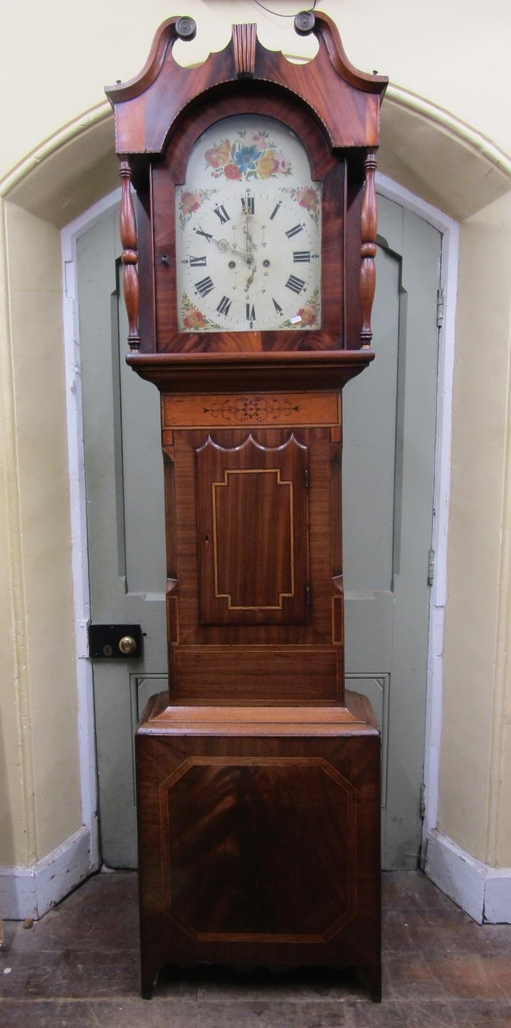 A substantial Regency longcase clock, the mahogany case with inlaid detail, the hood with swan