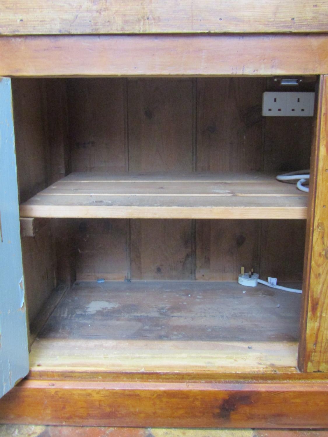 A large pine farmhouse kitchen dresser base partially enclosed by four twin rectangular panelled - Image 3 of 3