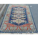 A Kazak design rug with four stepped medallions and geometric borders, 200 mx 140 cm approximately