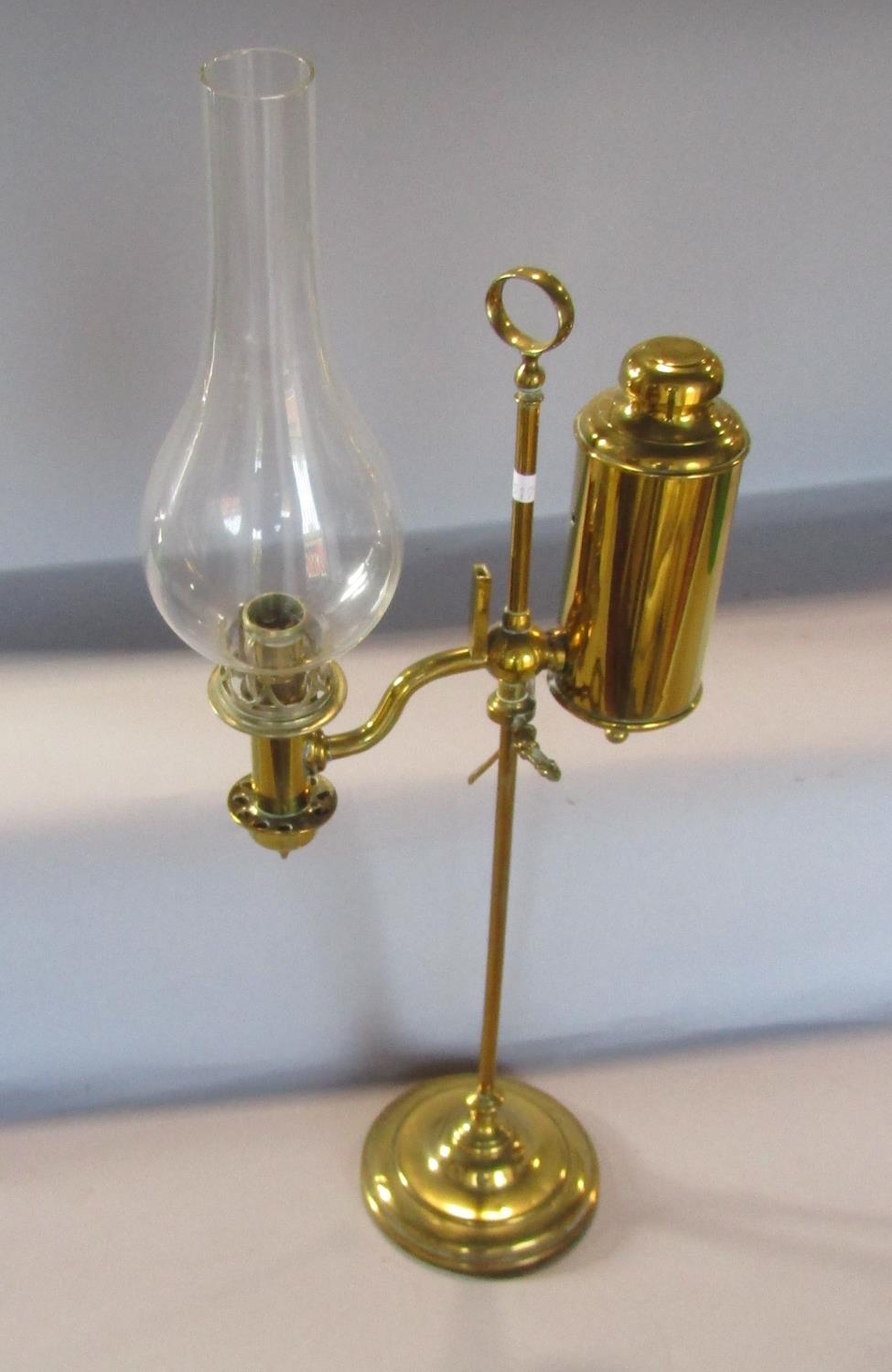 A late 19th century brass Student Colza Lamp with height adjustment, with later electric cable and