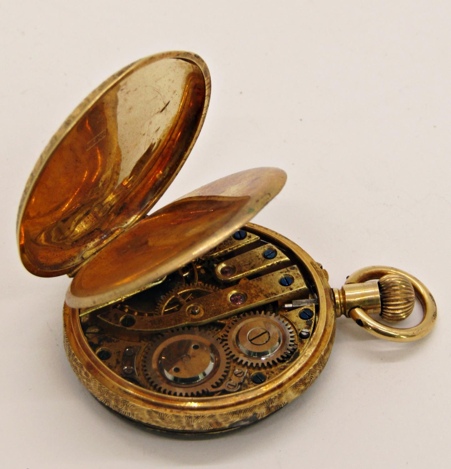 A 19th century continental fob watch with 18k engraved casework and chased dial - Image 4 of 5