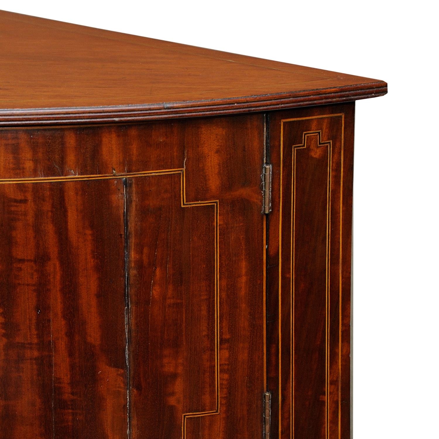 A Georgian mahogany corner commode with rising lid, with bowfronted outline, the front elevation - Image 2 of 5