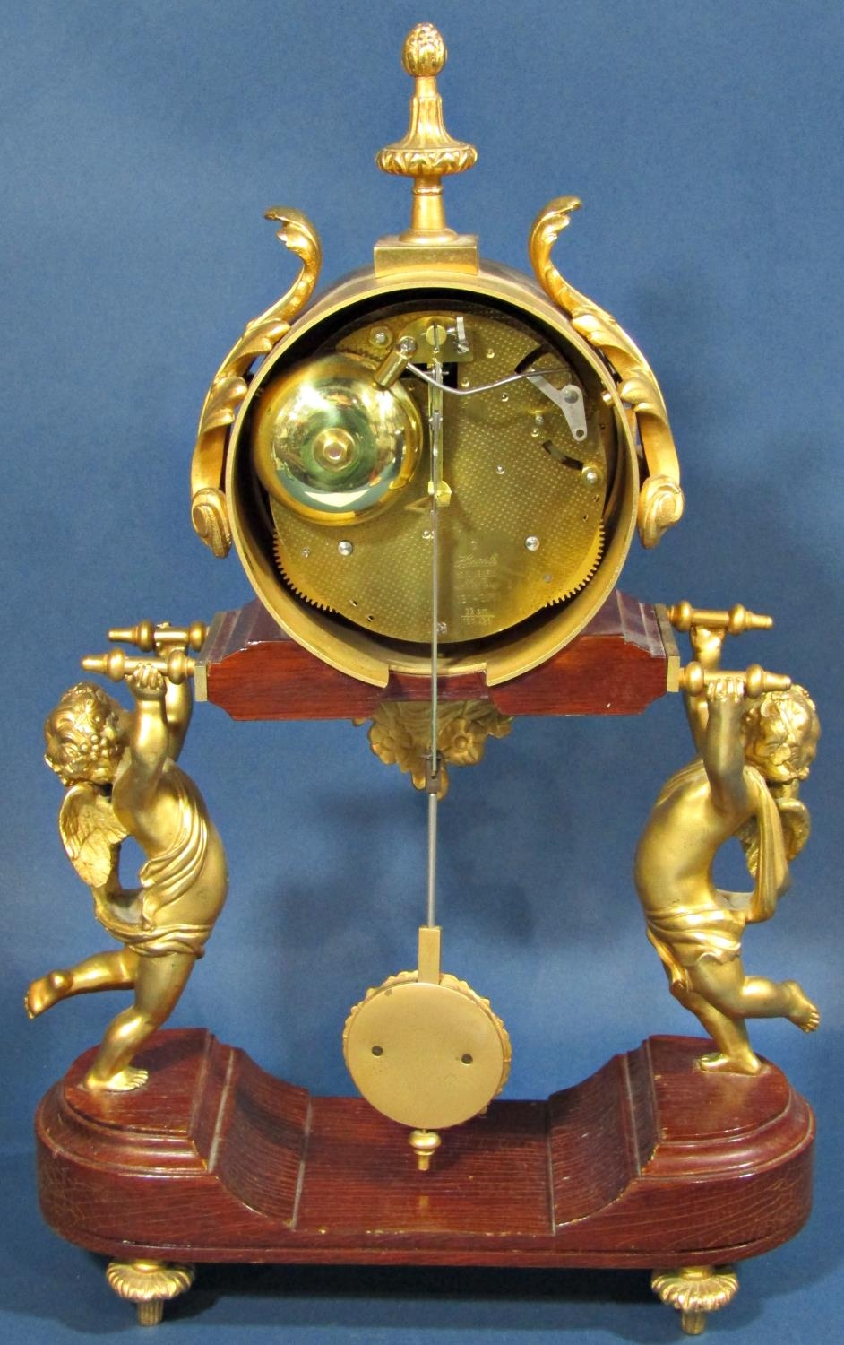 A contemporary mantle clock, the movement held aloft by two cherubs, with painted dial - Charles - Image 3 of 4