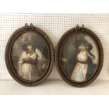 Two c.19th century hand-coloured prints of ladies in hats, in matching decorative oval frames, 44