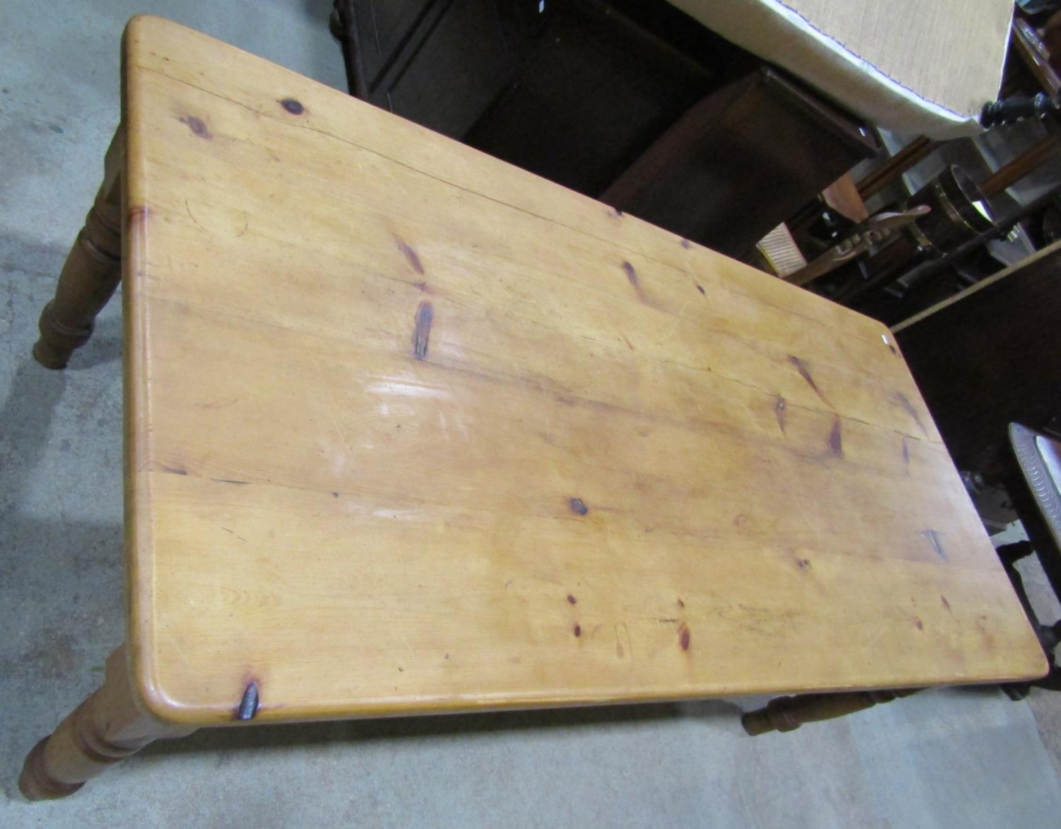 A Victorian style stripped pine farmhouse kitchen table, the rectangular top with rounded corners, - Image 2 of 4