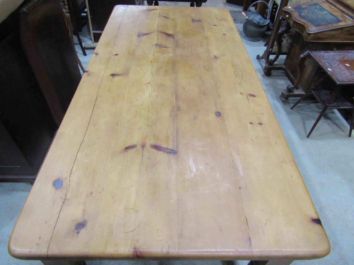 A Victorian style stripped pine farmhouse kitchen table, the rectangular top with rounded corners, - Image 4 of 4