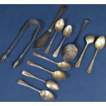 Silver flatware consisting of a sugar tong, a fish knife, a jam spoon and eight assorted teaspoons.