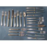 Guy Degrenne inox cutlery to serve eight with ribbed handles and gold collars including fish