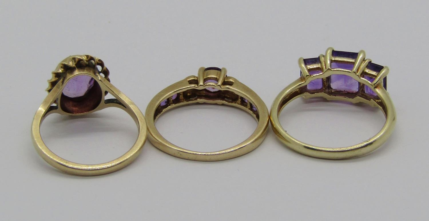 Three 9ct amethyst rings to include a diamond set example, 7.1g total (3) - Image 3 of 3