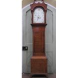 Georgian mahogany longcase clock, the hood with swan neck pediment enclosing an arched and painted