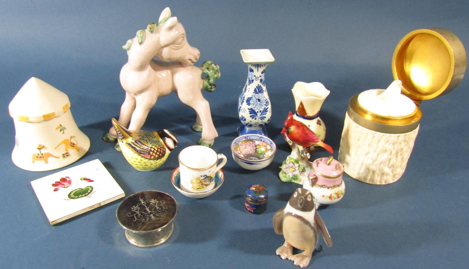 A collection of china miniatures comprising cups, saucers, bowls, etc, to include a Coalport