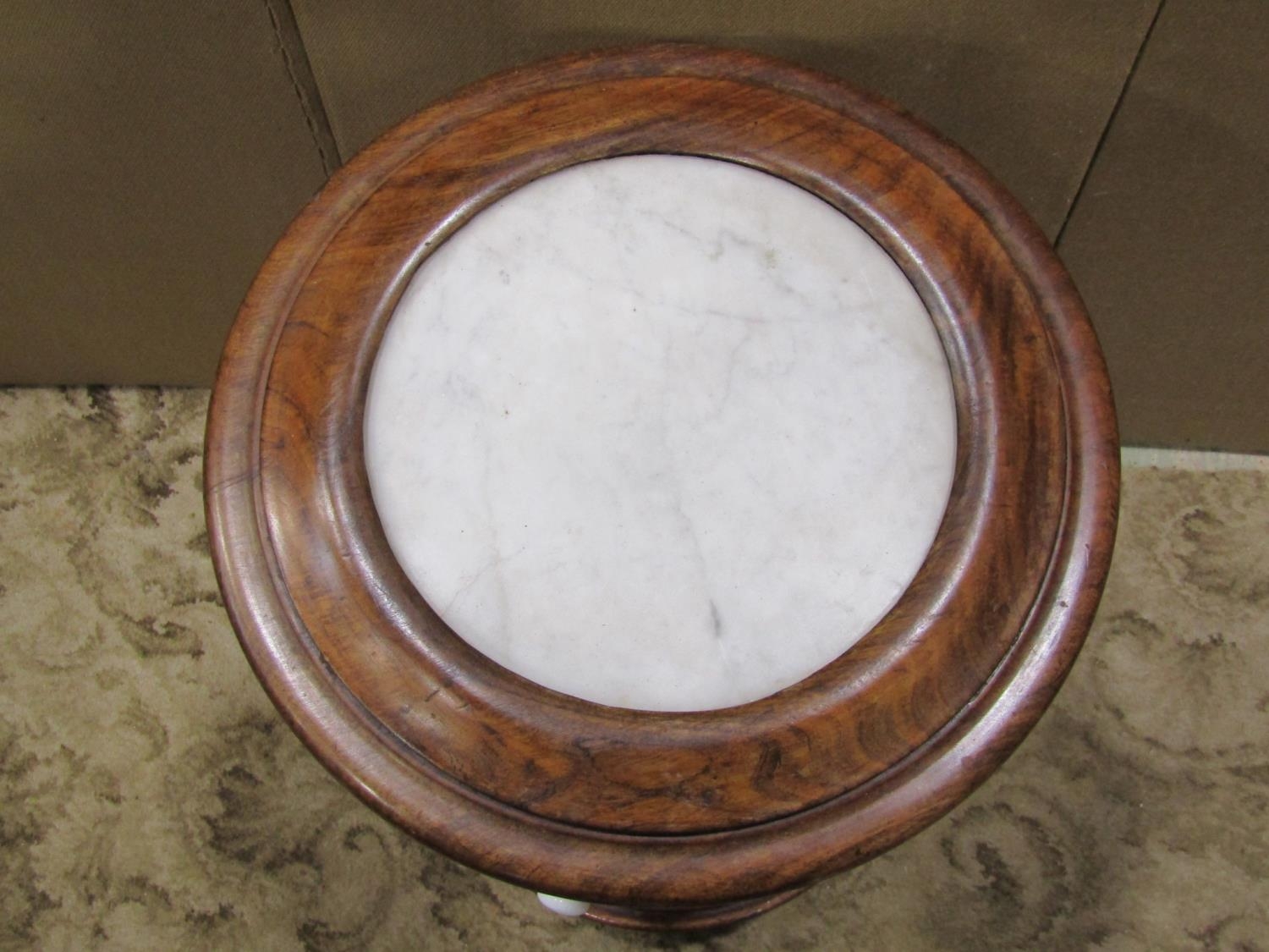 An unusual Victorian mahogany cylindrical pot cupboard, the hinged inset marble top enclosing a - Image 2 of 2