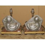 A pair of novelty table lamps in chrome, wood and tin with vintage duck moulds