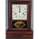 A Seth Thomas mantle clock in rosewood case, with 30 hour striking movement