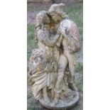 A weathered cast composition stone Romeo and Juliette garden figure group, 68 cm high