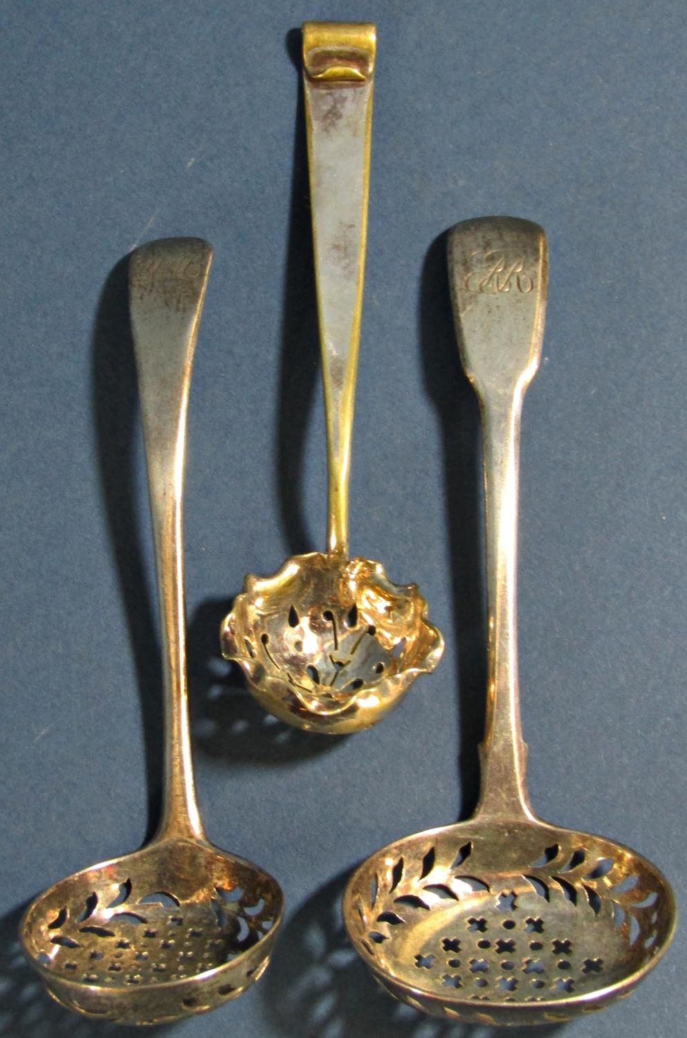 Three silver casting spoons (two Georgian) and two pairs of sugar tongs, 5 oz - Image 2 of 4