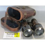 A pair of military binoculars by W Watson & Son London, no 01231 MKV dated 1903, with leather case