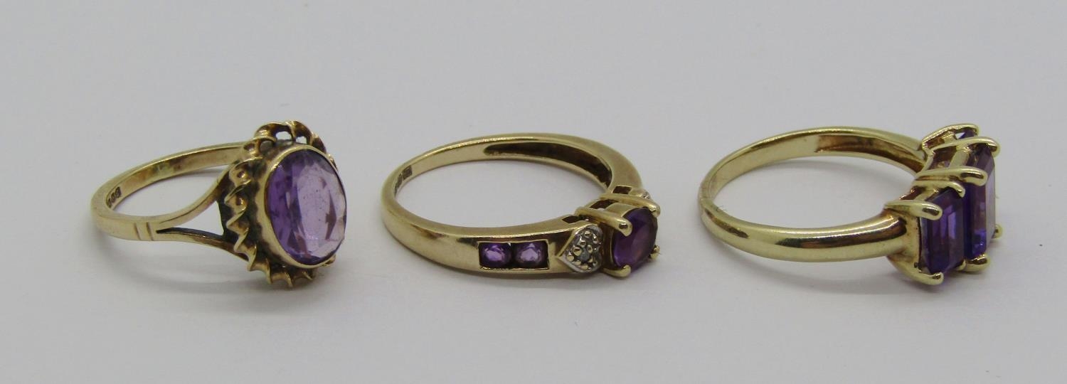 Three 9ct amethyst rings to include a diamond set example, 7.1g total (3) - Image 2 of 3