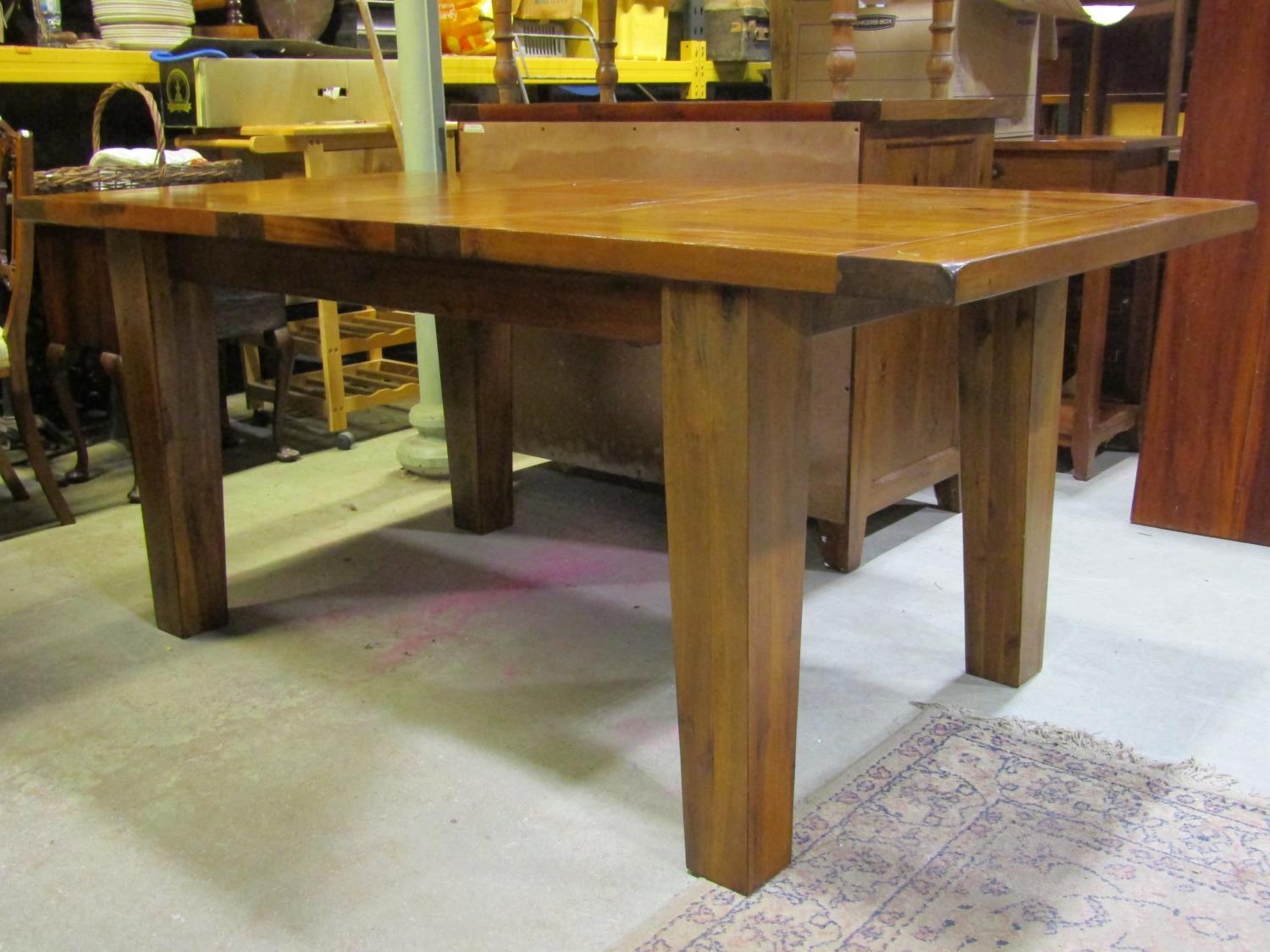 A contemporary hardwood dining room suite comprising pull out extending table of rectangular form - Image 4 of 6