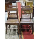 A set of four 19th century country made bar back dining chairs with solid seats raised on square