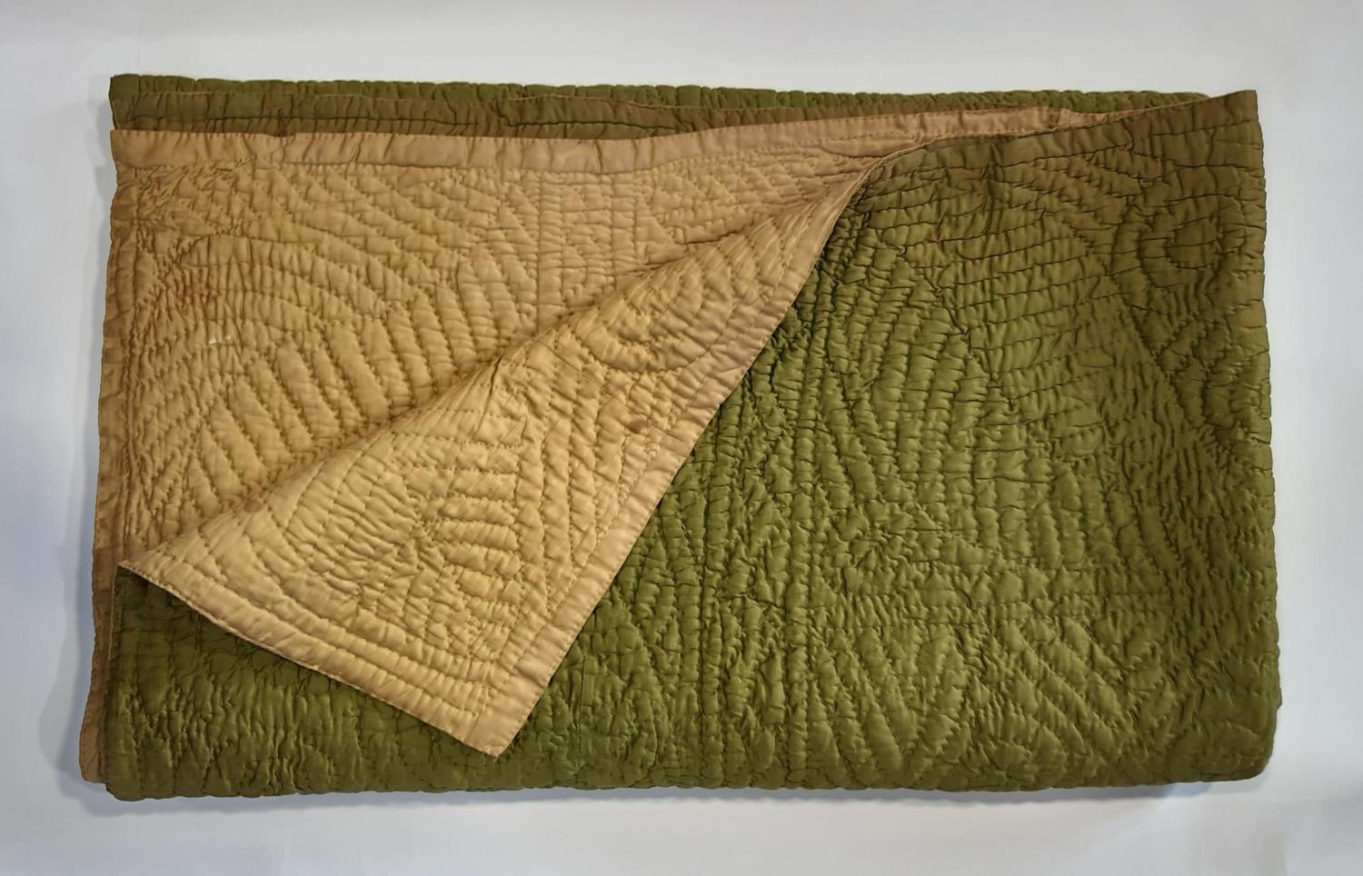 Hand stitched reversible vintage bed quilt in olive and dark gold colours, quilted in running
