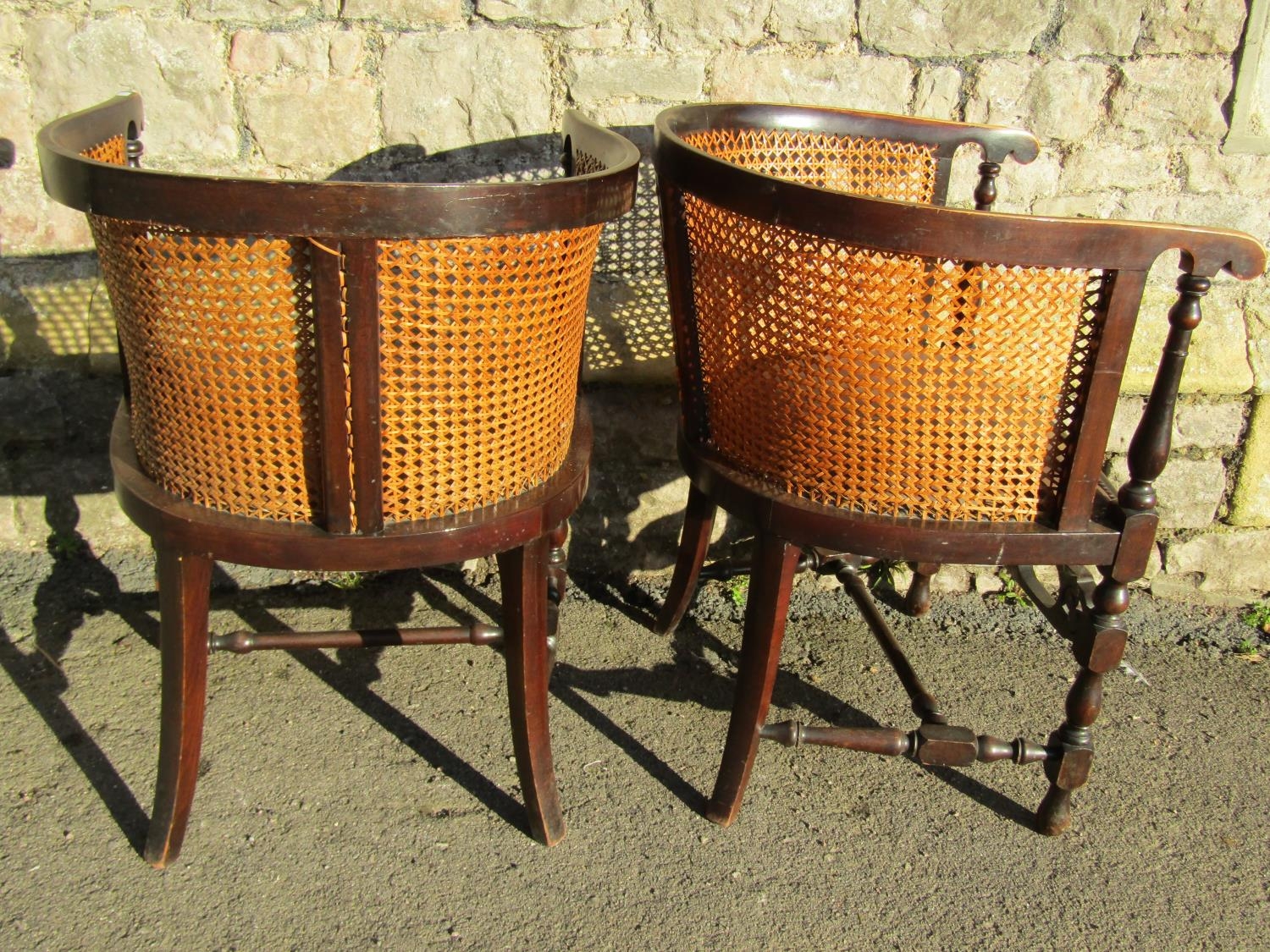 A pair of early 20th century bergere tub chairs with stained beechwood frames, leather upholstered - Image 2 of 2