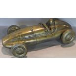 A cast resin desk ornament in the form of a vintage Mercedes racing car