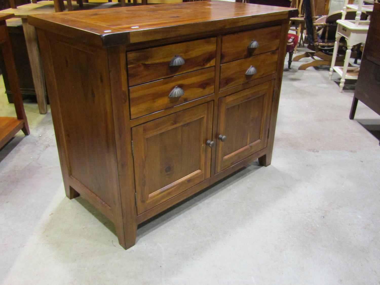 A contemporary hardwood dining room suite comprising pull out extending table of rectangular form - Image 2 of 6