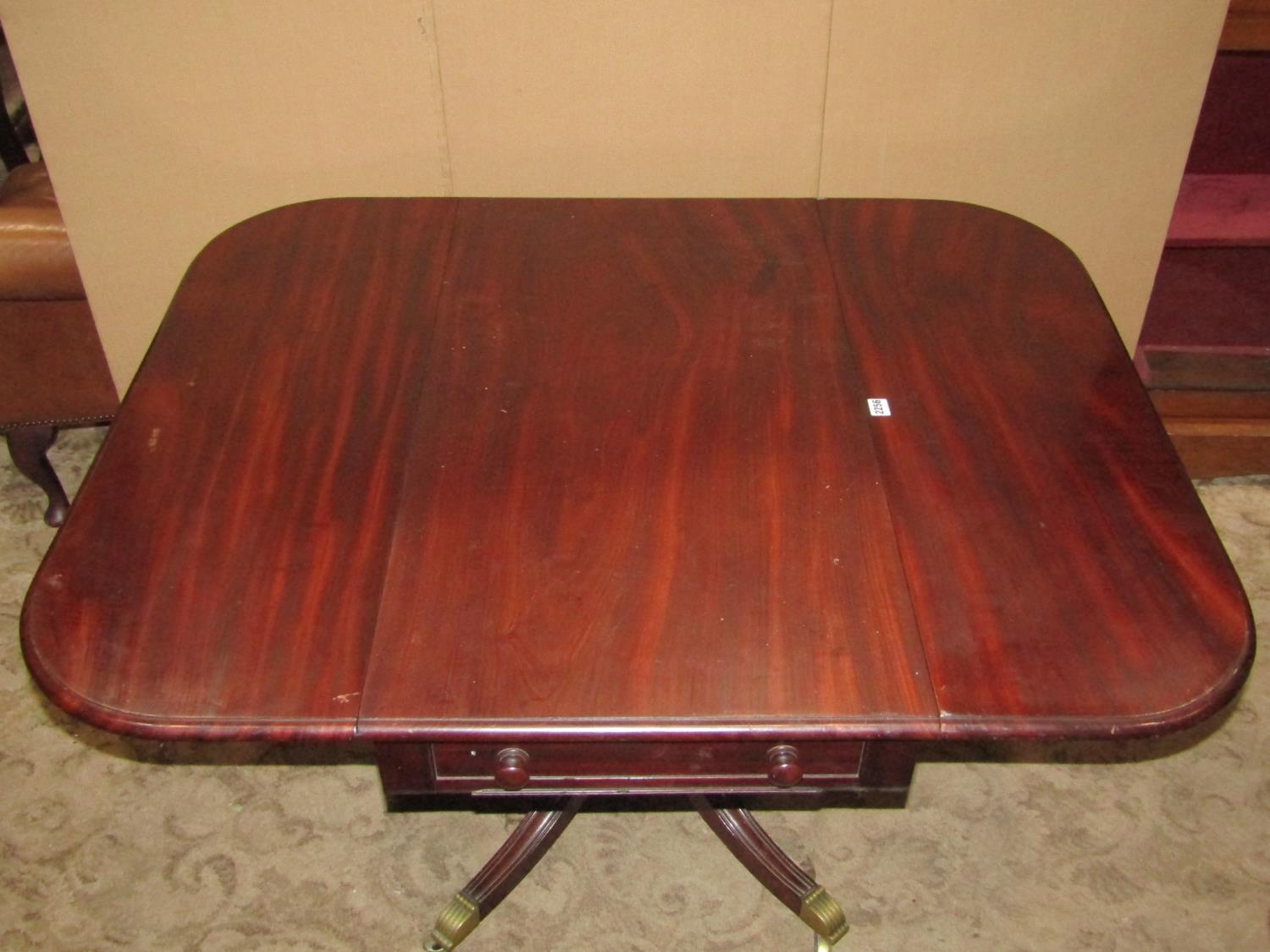 A 19th century mahogany drop leaf Pembroke breakfast table raised on a central turned pillar, 98 - Image 2 of 2