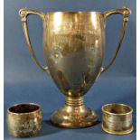 A 1930s silver twin handled trophy, London 1935, maker Henry Hodson Plante, 18cm high, together with