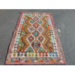 A Chobi Kilim with a stepped overall diamond pattern 197cm x 129cm approx.