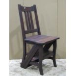 A reproduction hardwood metamorphic chair/steps