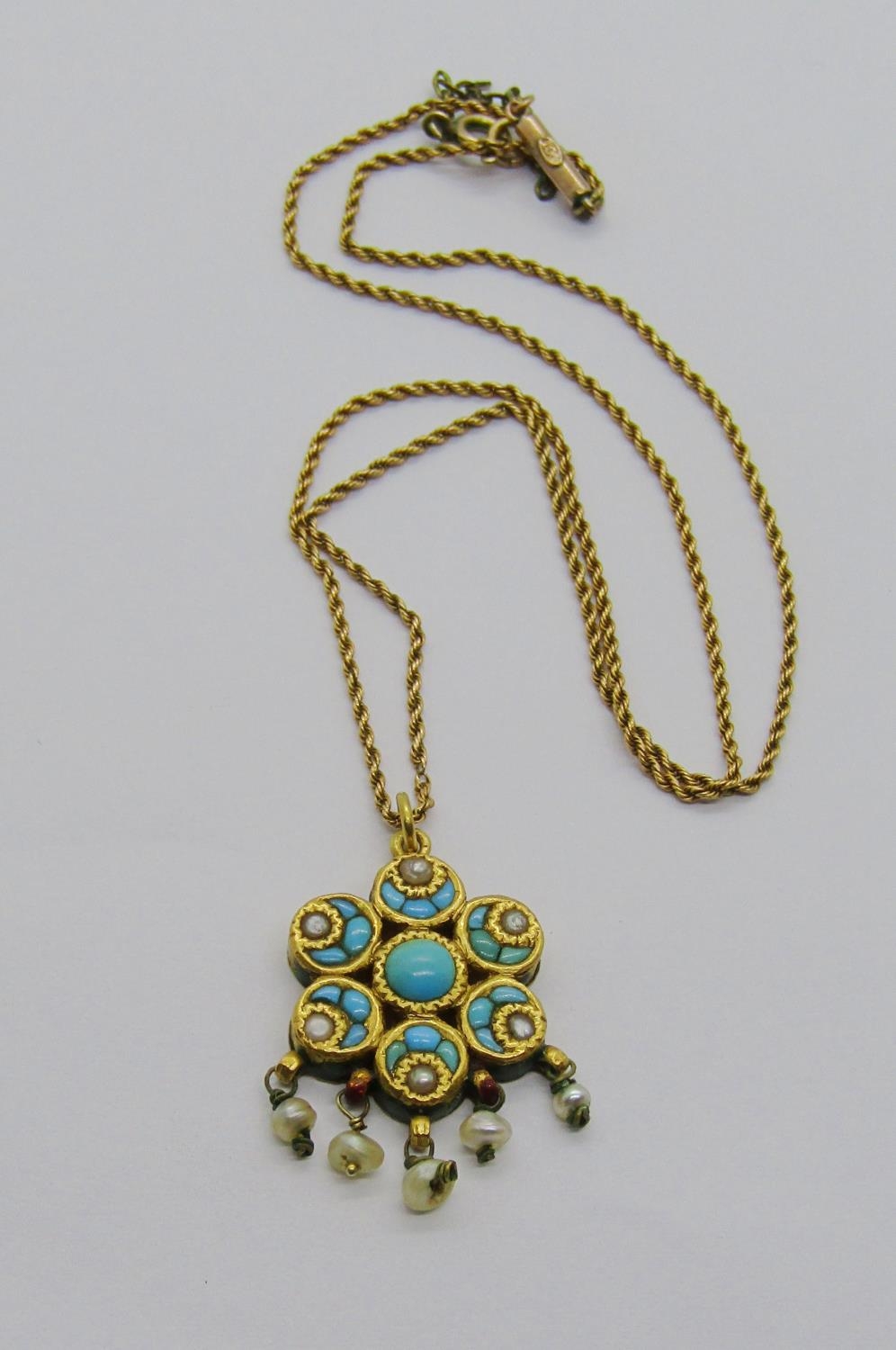 Antique Indian yellow metal reversible flower head pendant with baroque pearl fringe, one side set