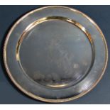 A silver dish, 23 cm in diameter etched with the image of the racehorse Brigadier Gerard with Joe