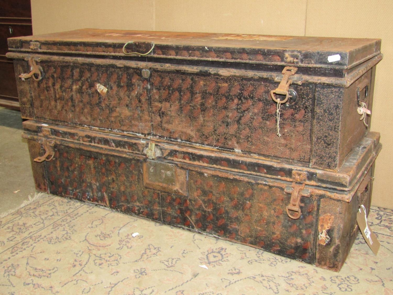 Two vintage Japanned steel trunks one with painted lettering to lid, H M Darlow, RN, 107 cm long x