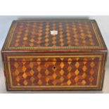 A Victorian parquetry work box with tumbling cube detail, within string lined borders, with fitted