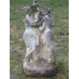 A small weathered Three Graces cast composition stone garden ornament 55 cm high