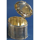 A silver tea caddy with hinged lid, London 1926, maker Garrard, 10.5cm wide x 9cm high, 10.3oz