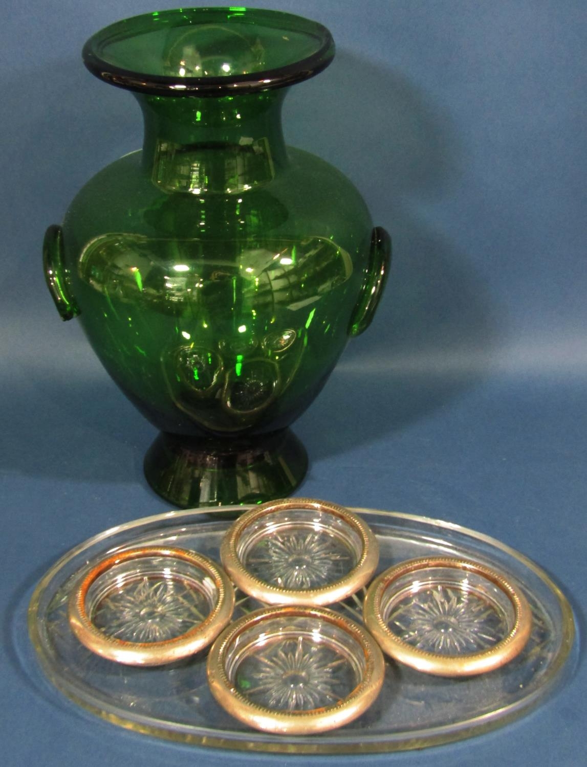A mixed selection of glassware including two dressing table trays, three decanters, an oval tray,