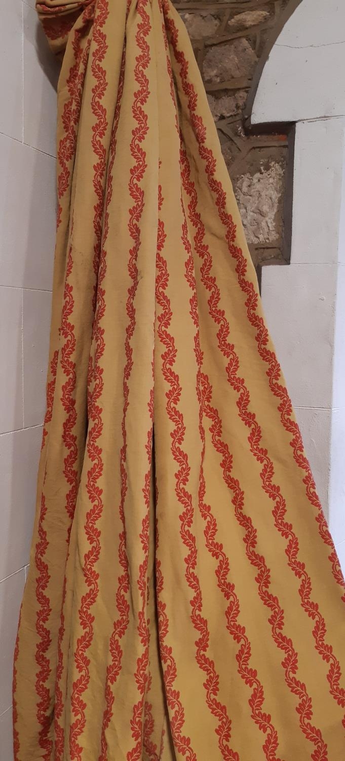 One pair of curtains and a matching single curtain in heavyweight gold and red fabric, lined and