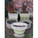 Two pairs of weathered cast composition stone garden planters of varying size and design, together