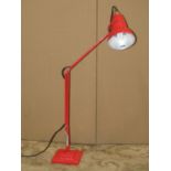 A Herbert Terry & Sons Ltd anglepoise table lamp raised on a square to step base